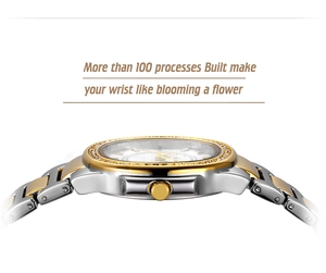 Detailed side view of two-tone gold and silver watch with diamond bezel on white background
