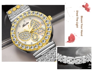 Dettaglio di un orologio di lusso da donna con farfalla di diamanti e quadrante in perla
