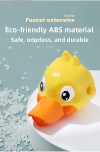 Close-up of yellow duckling faucet extender made of eco-friendly ABS for toddlers