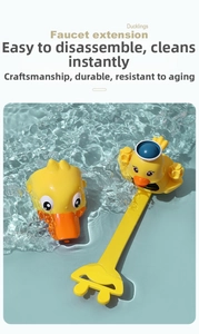 Close-up of cute yellow duck faucet extender showing flexible silicone water guide design