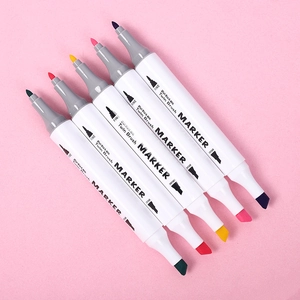 Five assorted dual-tip markers with fine and broad tips on a soft pink background
