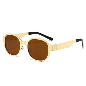 Vintage round gold metal sunglasses for women with thick frames and brown lenses