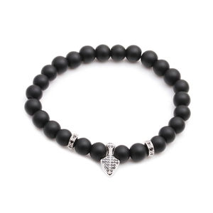 Matte black beaded bracelet set featuring silver crystal balls and an arrow pendant