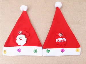 Detail of red Christmas hats featuring Santa Claus and Snowman felt appliques