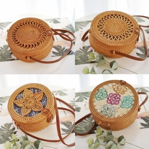Detail of handmade round rattan crossbody bags with leather straps and four unique patterns