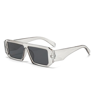 Modern flat top square sunglasses with transparent grey frame and dark grey lenses