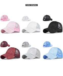 Detail display of ponytail mesh trucker hats in various colors with camo texture
