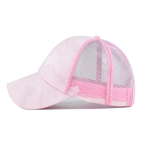 Side view of women's pink camouflage ponytail baseball cap with breathable mesh back panels