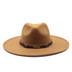Classic tan wool fedora hat with wide brim and ethnic beaded band with metal feather charm