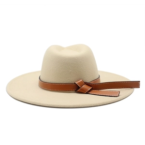 Classic beige wool fedora hat with brown leather band and wide brim for men and women