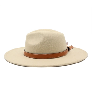 Classic beige wide-brim fedora hat with a vintage brown leather buckle band for style
