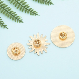 Golden celestial sun moon star alloy brooches with butterfly clutch on blue background