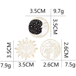 Three-piece set of celestial enamel pins featuring sun, moon, and ocean wave designs
