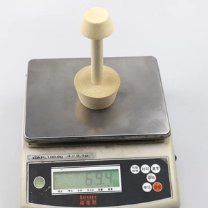 Molde de madera para tartas de huevo de doble punta pesado en balanza electrónica