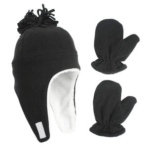 Detail of fleece winter hat and mittens set with soft faux fur lining and ear protection