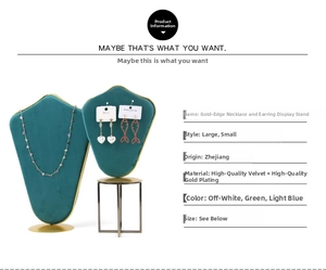 Detail of dark green velvet jewelry stand with gold-plated trim for necklaces and earrings