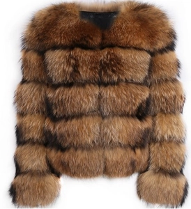 Detailed view of horizontal stripe faux fox fur stitching and thick fluffy texture