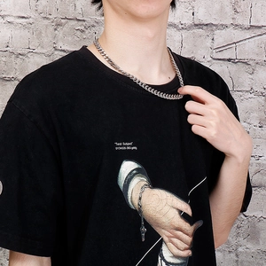 Men's 6mm silver curb chain necklace in street style worn by male model