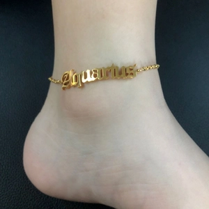 18K gold plated stainless steel Aquarius zodiac anklet worn on model ankle