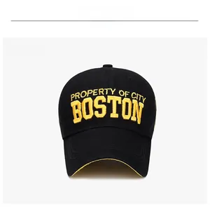 Front view of a black baseball cap featuring yellow 3D Boston embroidery and curved brim