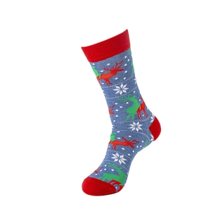 Detailed view of a blue Christmas cotton sock featuring festive reindeer and snowflake patterns