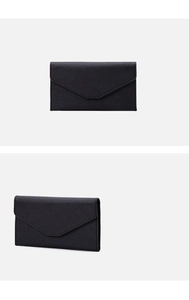 Detail view of the black crossgrain leather RFID travel wallet with folding design