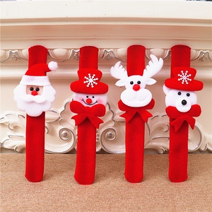 Glow-in-the-dark Christmas snap bracelets featuring Santa, snowman, elk, and bear characters