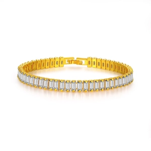 Close-up of emerald cut cubic zirconia stones set in a gold-plated Cuban tennis chain