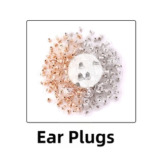 Close-up of rose gold and silver earring backs in saucer design on white background