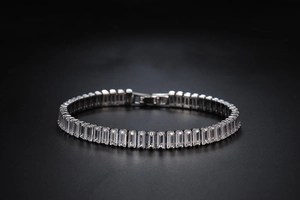Macro view of silver HIPHOP bracelet with rectangular cut cubic zirconia stones