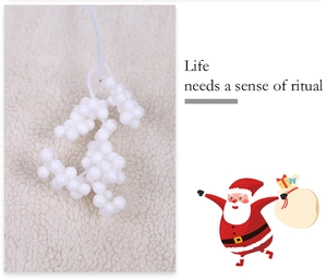 Macro detail of white foam berry pick for DIY Christmas tree ornaments and holiday decor