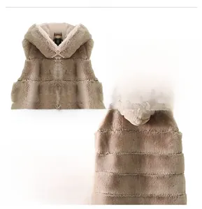 Close-up of the plush faux fur texture and striped hood design of the khaki vest