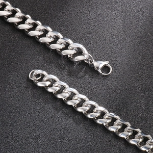 Detail of silver stainless steel Cuban link chain with a secure lobster clasp closure