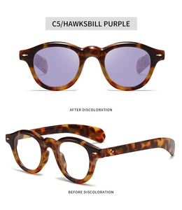 Détail macro de lunettes de soleil ovales en PC avec verres photochromiques violets