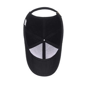 Internal view of a black 6-panel cotton baseball cap showing reinforcement and metal buckle