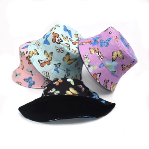 Set of 4 reversible butterfly print bucket hats in pink, blue, purple, and black colors