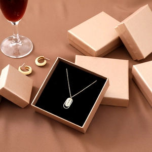 Champagne gold jewelry box for rings and necklaces with luxury kraft paper texture
