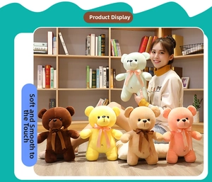 Detailed view of colorful plush teddy bears with silk bows in a warm home setting