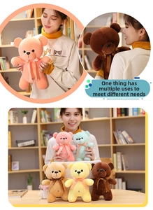 Detail of colorful teddy bear plushies with silk bows in various vibrant colors