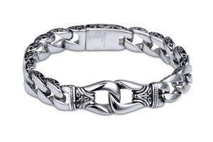Detailed macro view of 316L stainless steel bracelet with black vintage floral engravings