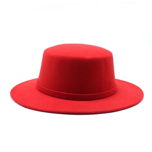 Detailed flat-top red wool felt boater hat featuring a matching decorative ribbon band