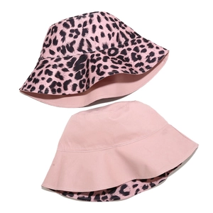 Detail showing the reversible design of the pink leopard print bucket sun hat for women