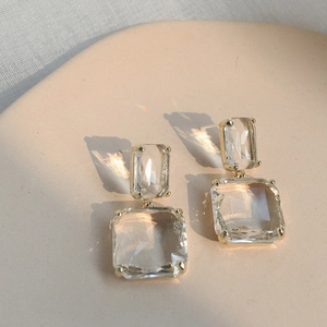 Geometric square crystal drop earrings with transparent stones and gold plating