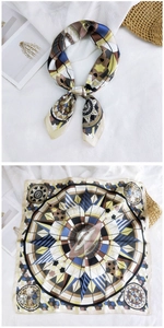 Detail of printed vintage square silk scarf with planetary and geometric patterns