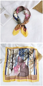 Artistic forest animal print silk square scarf tied and displayed on white linen background
