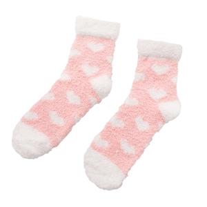 Pink coral fleece socks with heart patterns and soft white elastic cuffs