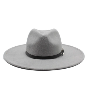 Close-up of light grey wool fedora featuring a black leather band and silver buckle