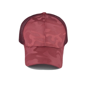Detail of burgundy camouflage ponytail baseball cap showing breathable mesh back and seams
