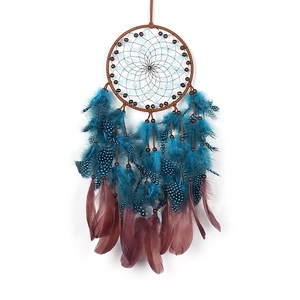 Vintage dream catcher hanging decoration with brown frame and blue spotted feathers