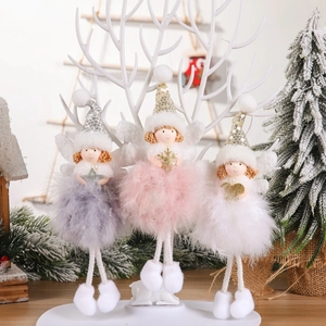 Three plush Christmas angel ornaments with sequins and feathers hanging on tree branches